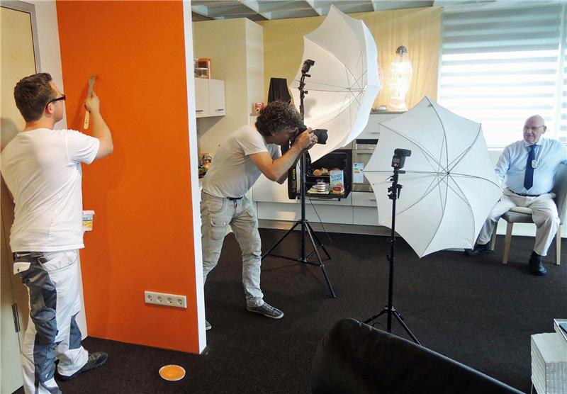 Das Bild zeigt drei Männer.