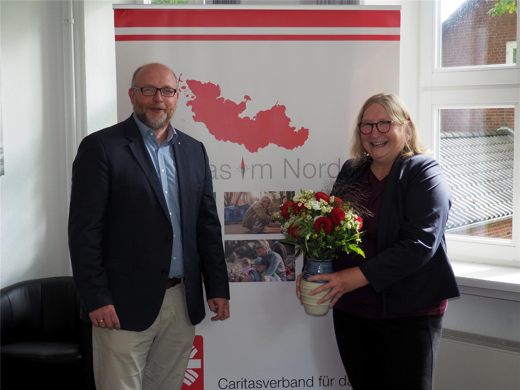 DiözCarDir Steffen Feldmann mit Sabine Depew Amtseinführung