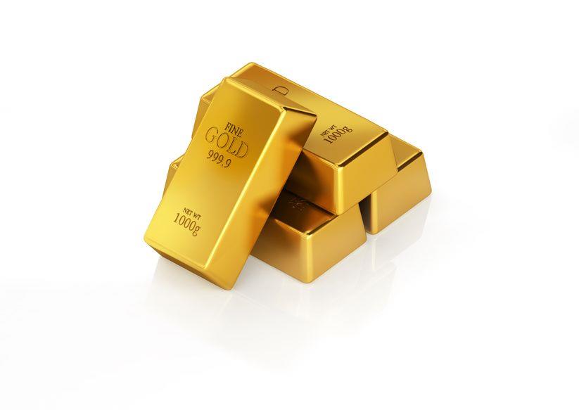 vier gestapelte Goldbarren