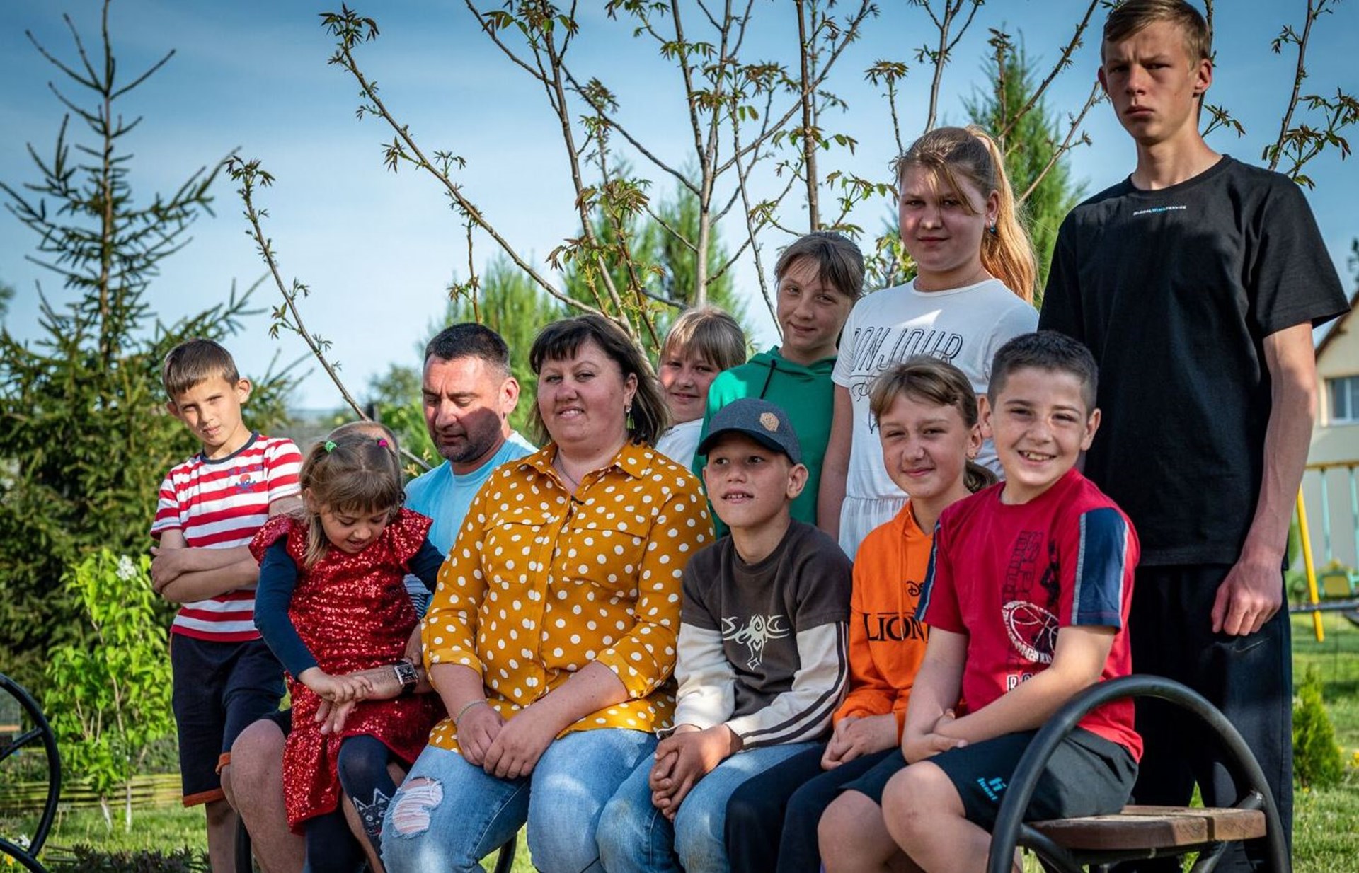 Natalia und Oleh Halchyshak und Kinder
