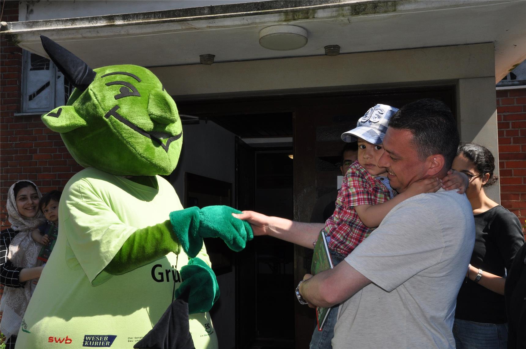 Grünhold dankt Flüchtlingen