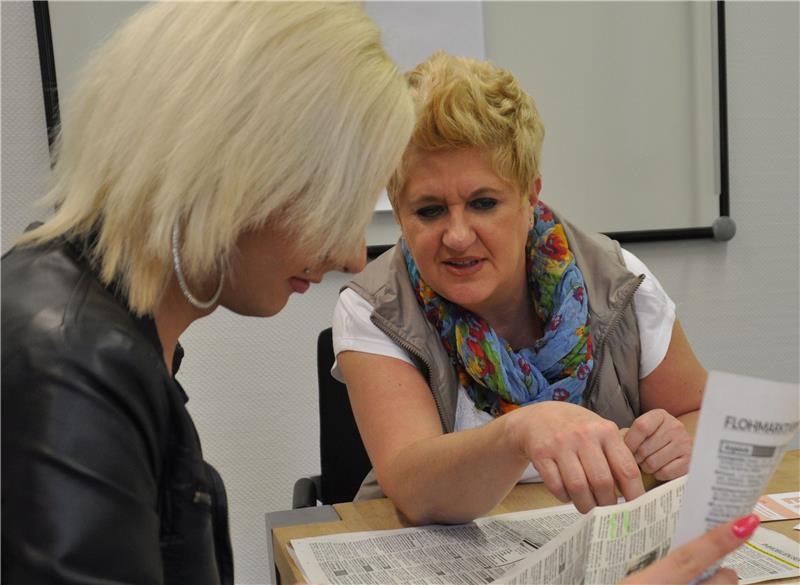 Beraterin im Gespräch mit Hilfesuchenden